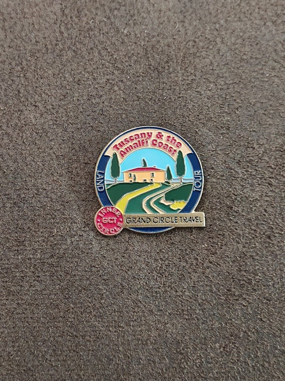 Grand Circle Travel Inner Circle Gold Tone Enamel Pin
