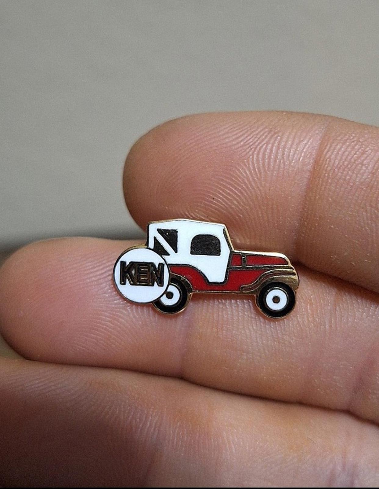 1970s Gold Tone White & Red Jeep With Ken Name On Tire Enamel Pin