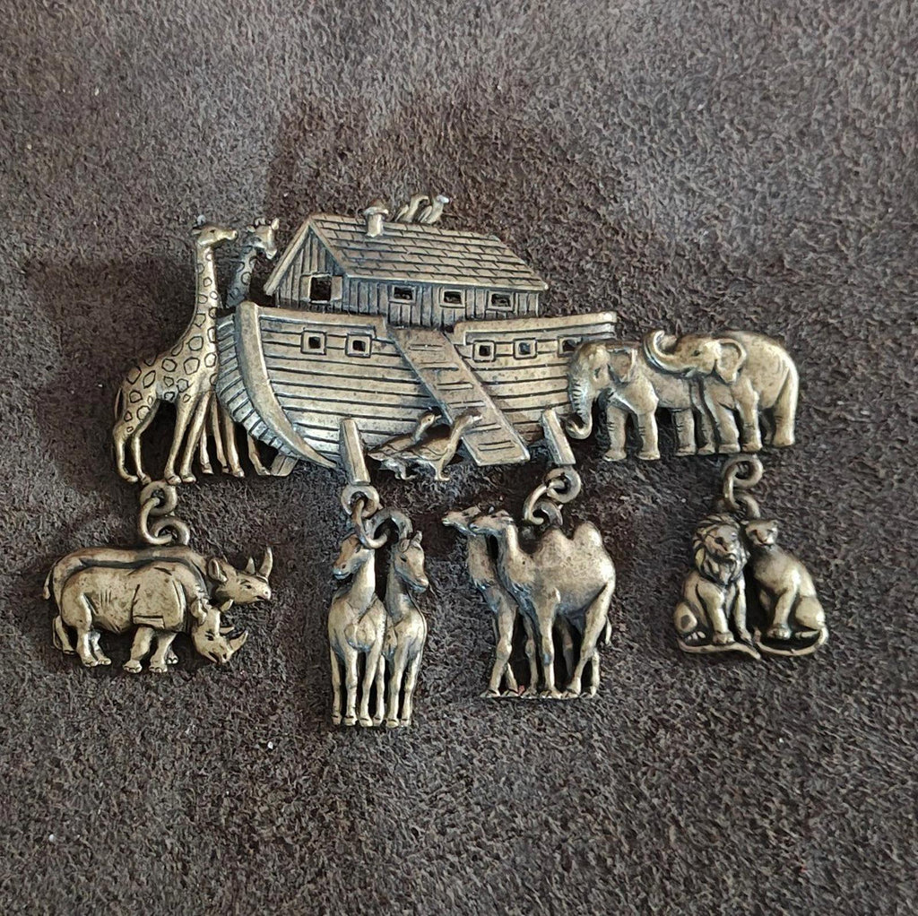 Gold Noah’s Ark brooch pin with ark and multiple dangling animal charms on chains