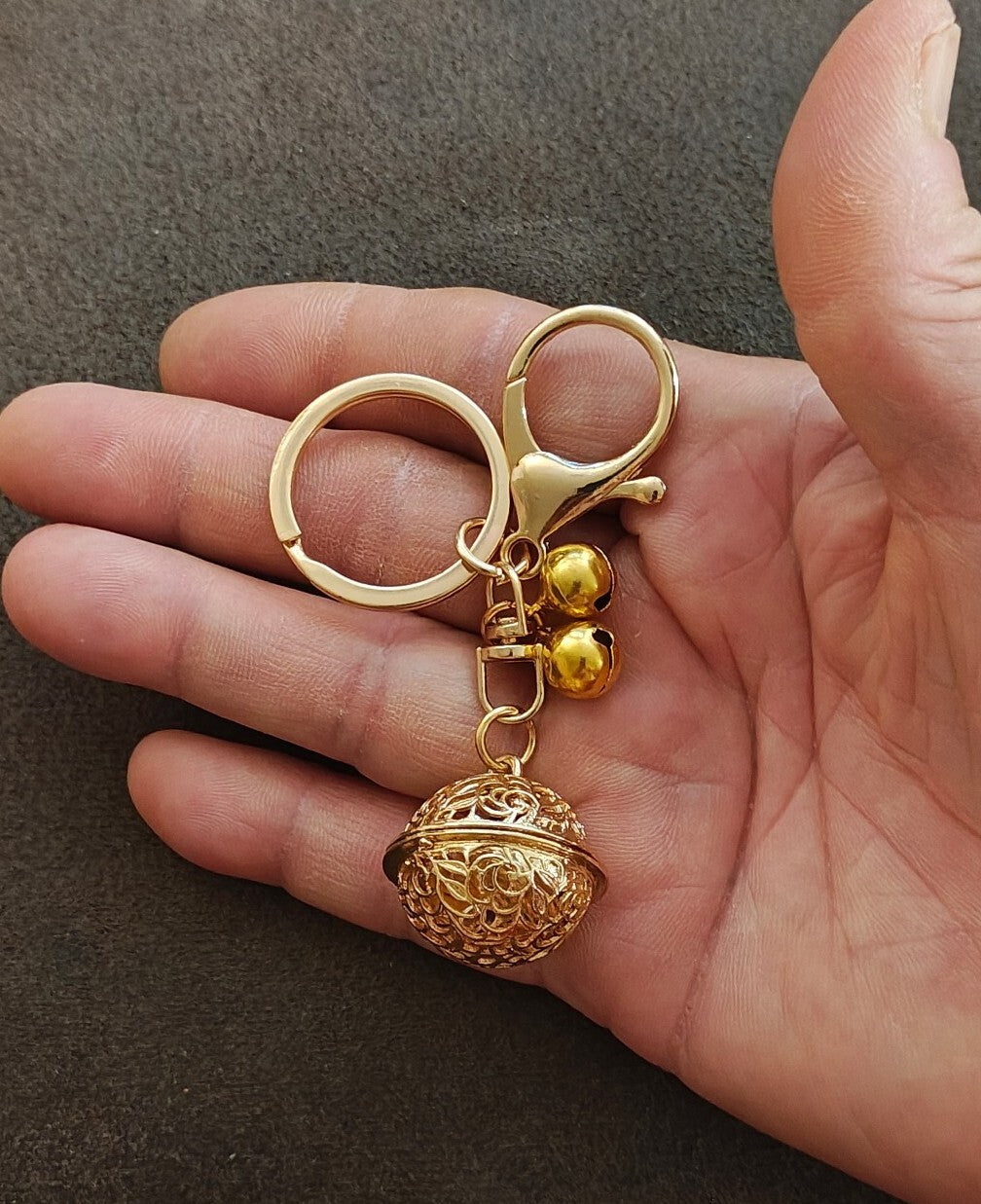 Gold Tone Filigree Chime Ball Keychain