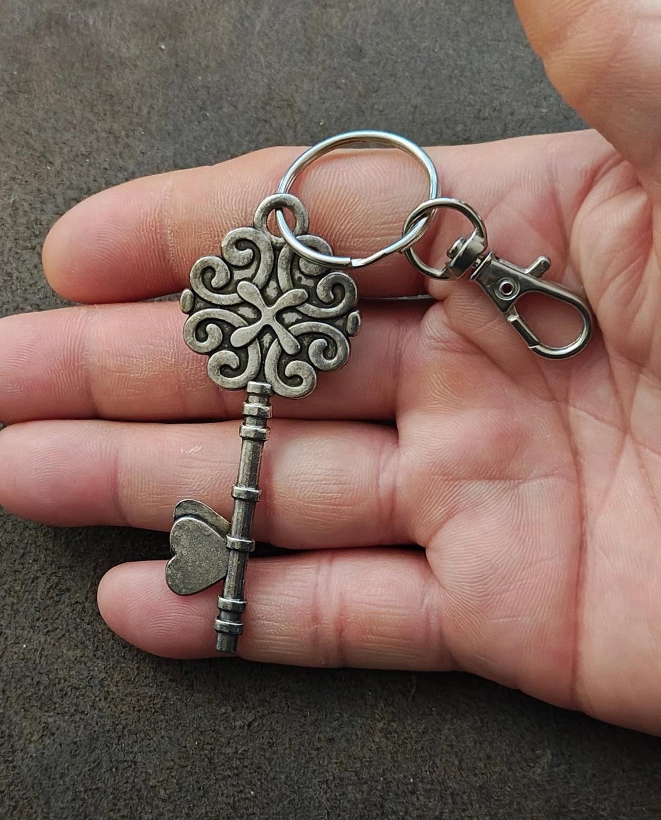 Vintage Style Skeleton Key Keychain With a Pink and White Rose Cabochon Pendant