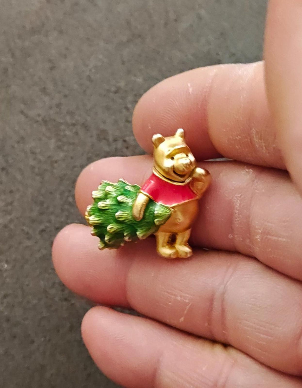 Gold-tone enamel Winnie the Pooh brooch with green Christmas tree, red outfit