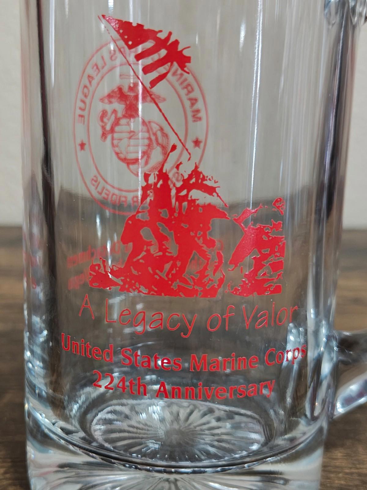 Clear beer mug close-up showing red 'Legacy of Valor' and Marine Corps 22nd Anniversary