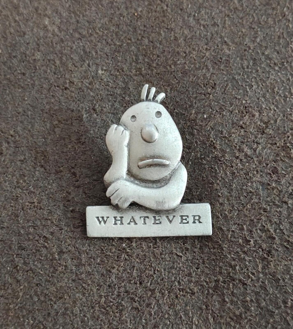 Vintage pewter cartoon pin, smiling character with raised hair and "WHATEVER" plaque