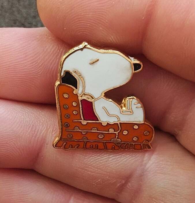 1970s Aviva Peanuts Snoopy in Orange Armchair Cloisonne Gold Tone Enamel Pin
