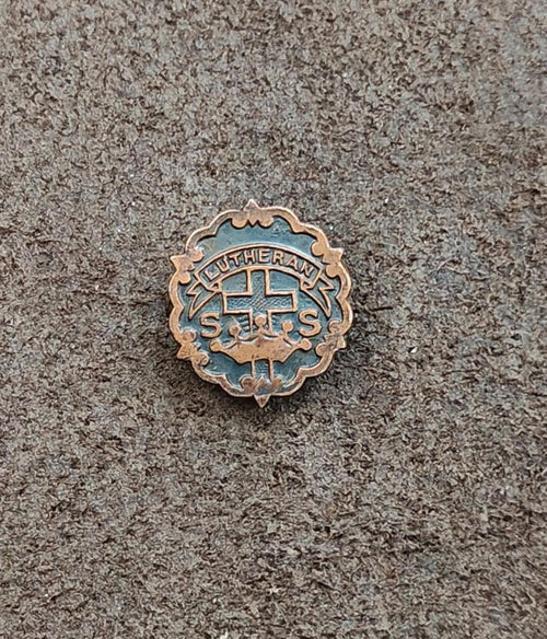 Bronze Lutheran Sunday School pin front with cross and ring lettering