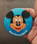 Blue Walt Disney World Mickey Mouse pinback button with smiling face and text