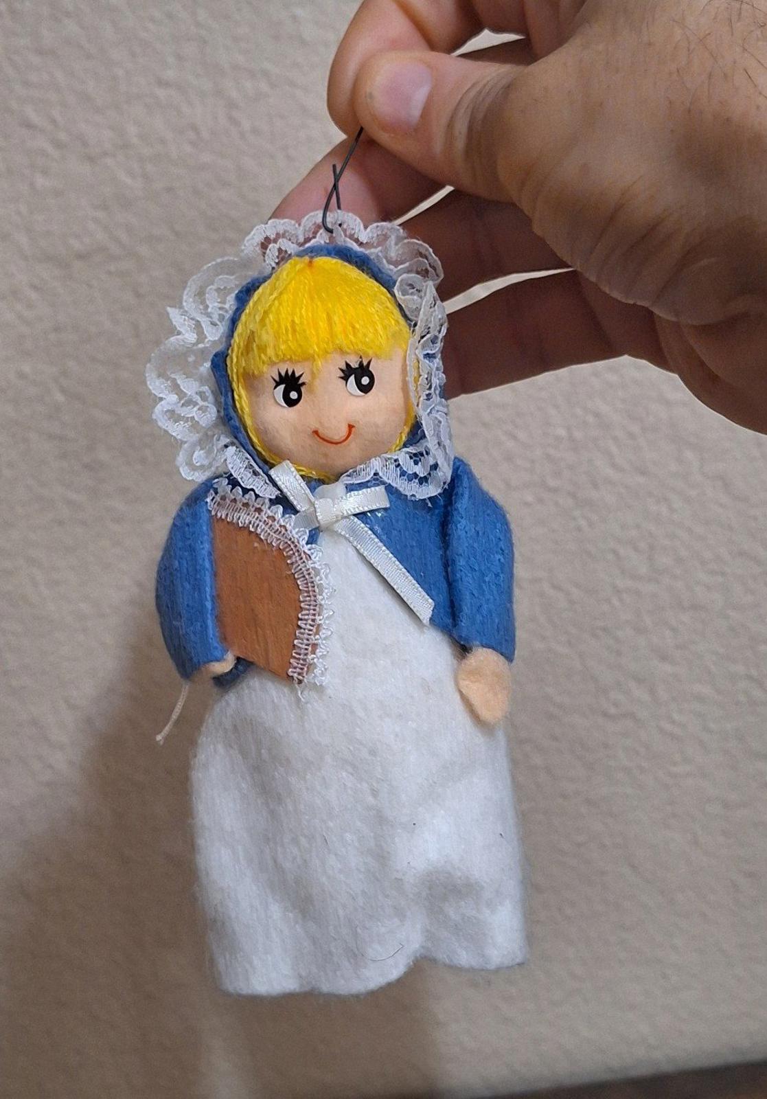 Handmade vintage pilgrim girl ornament figurine, blue bonnet and dress with lace trim