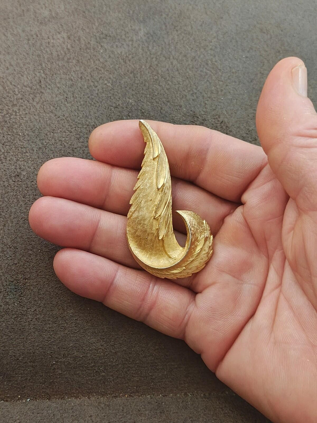 1960s Gold Tone Textured Feather Swirl Brooch