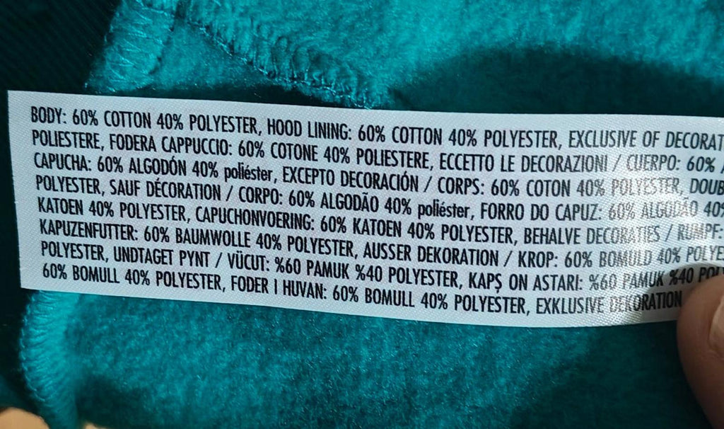Teal hoodie fabric content label with cotton and polyester blend details