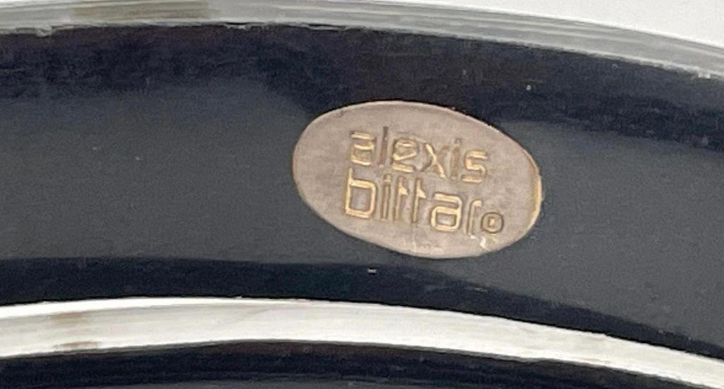 Alexis Bittar logo plate on black lucite bangle