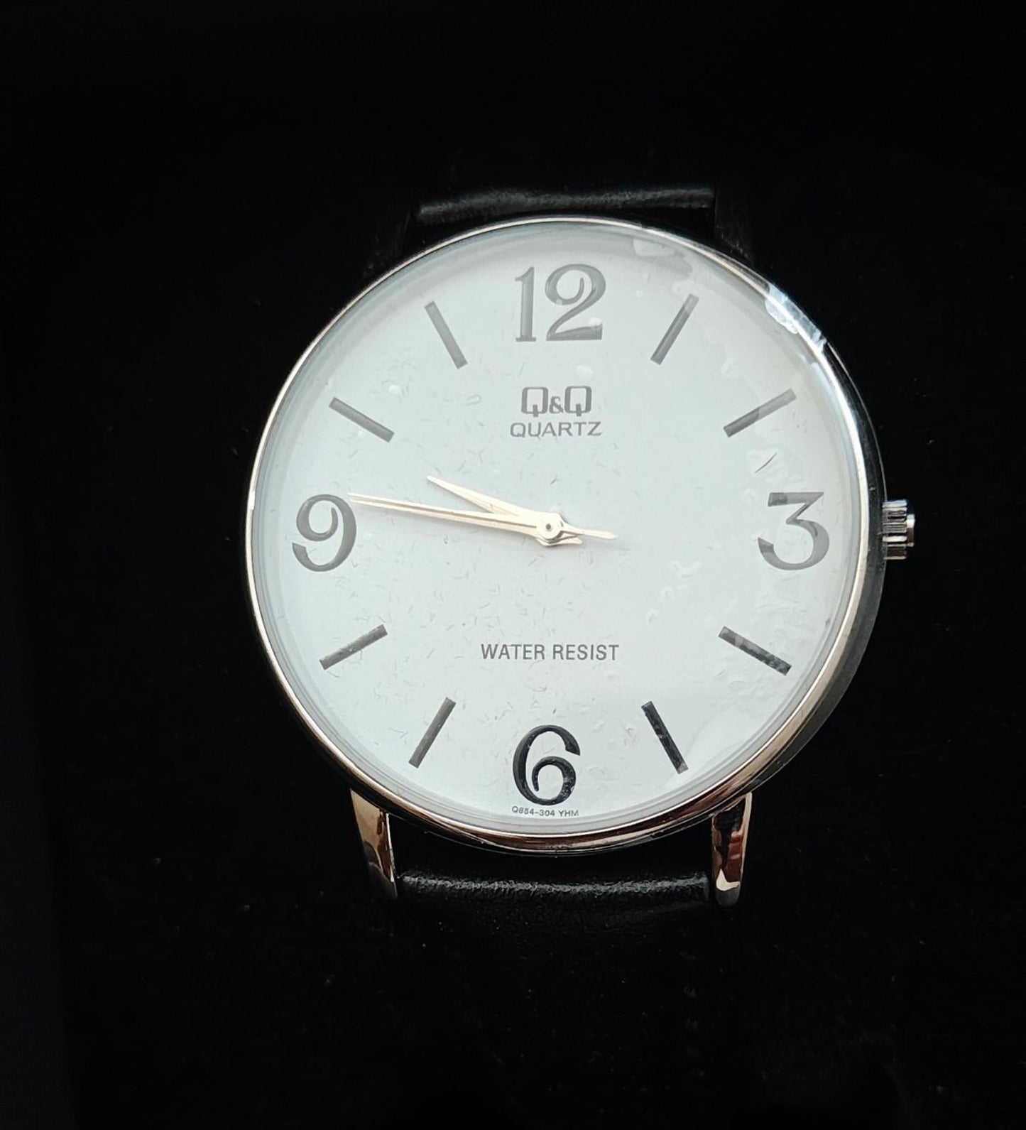 Q&Q Men's Analog Wrist Watch With White Dial and Black Leather Band.