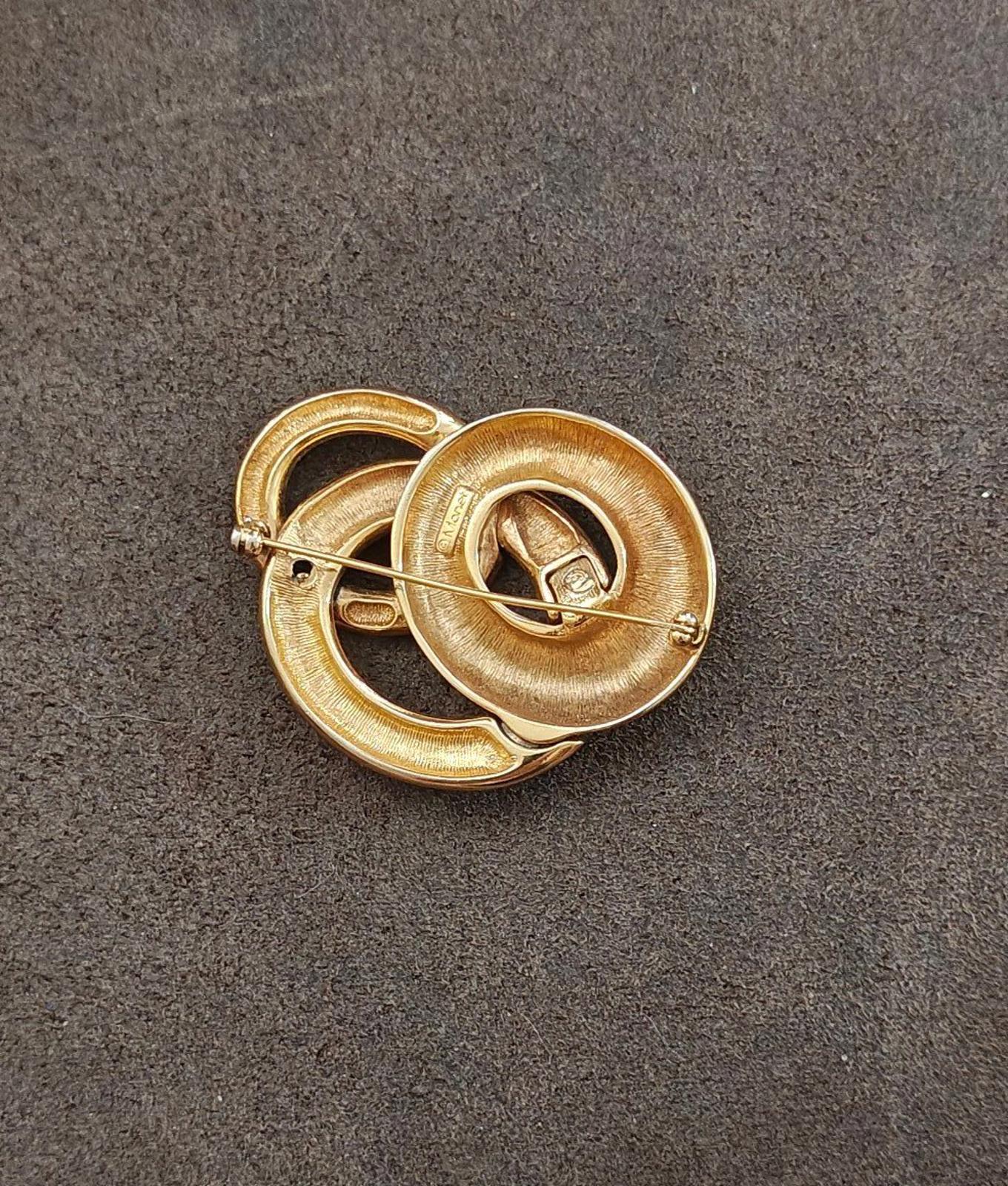 Gold-tone pin brooch back with safety clasp and pin mechanism