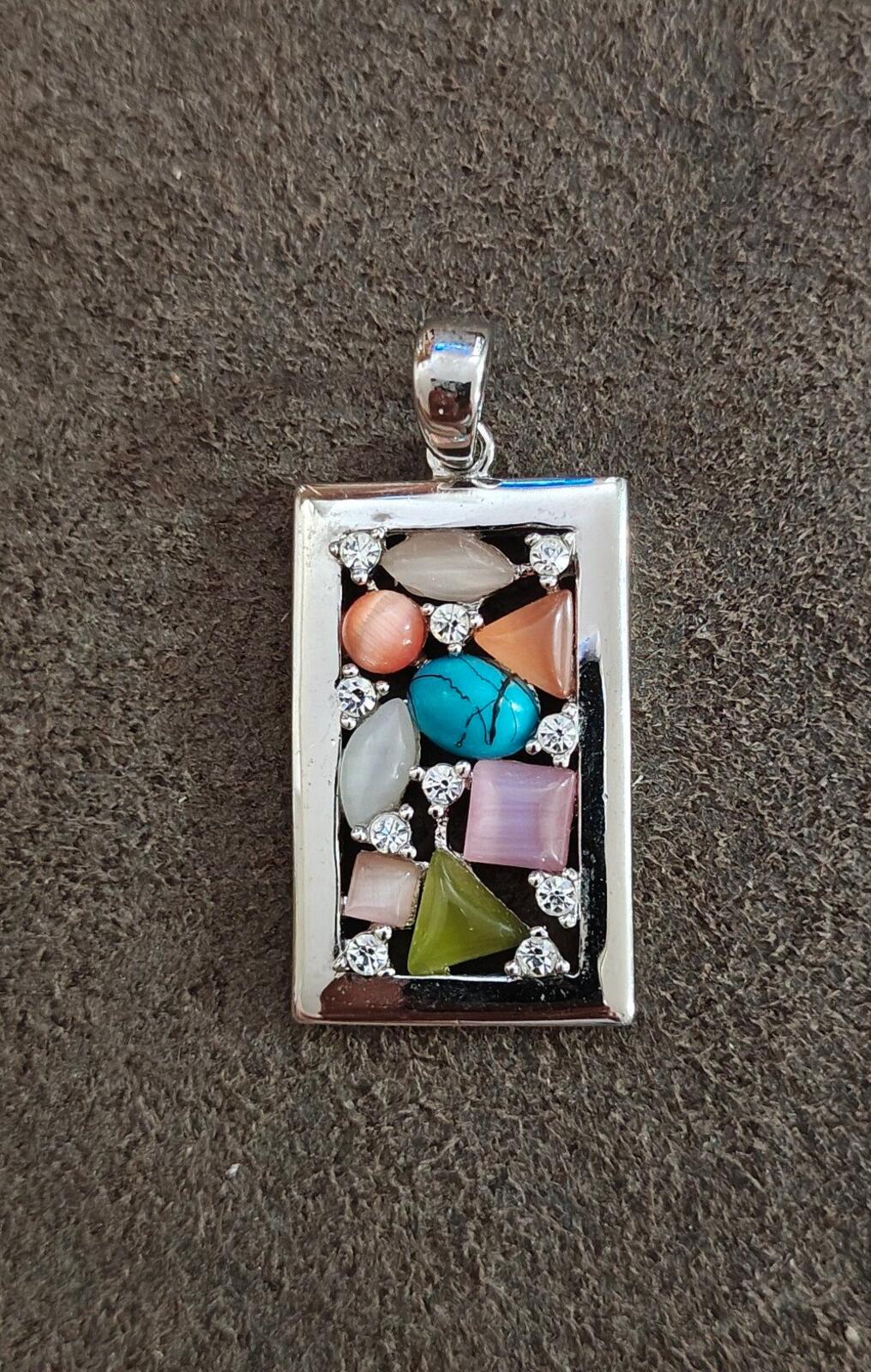 Lia Sophia Galileo Turquoise And Pastel Silver Tone Pendant
