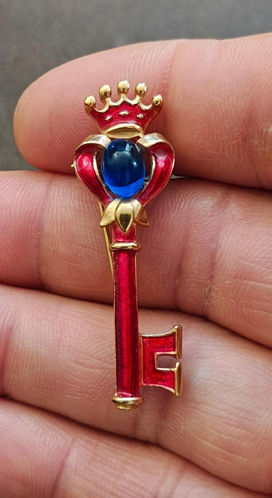 1940s/50s Crown Trifari Gold Tone Key Brooch With Red Enamel and Blue Cabochon