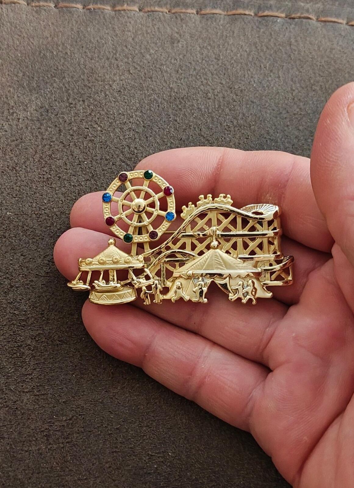 1980s Signed AJC Carnival Themed Gold Tone Brooch.