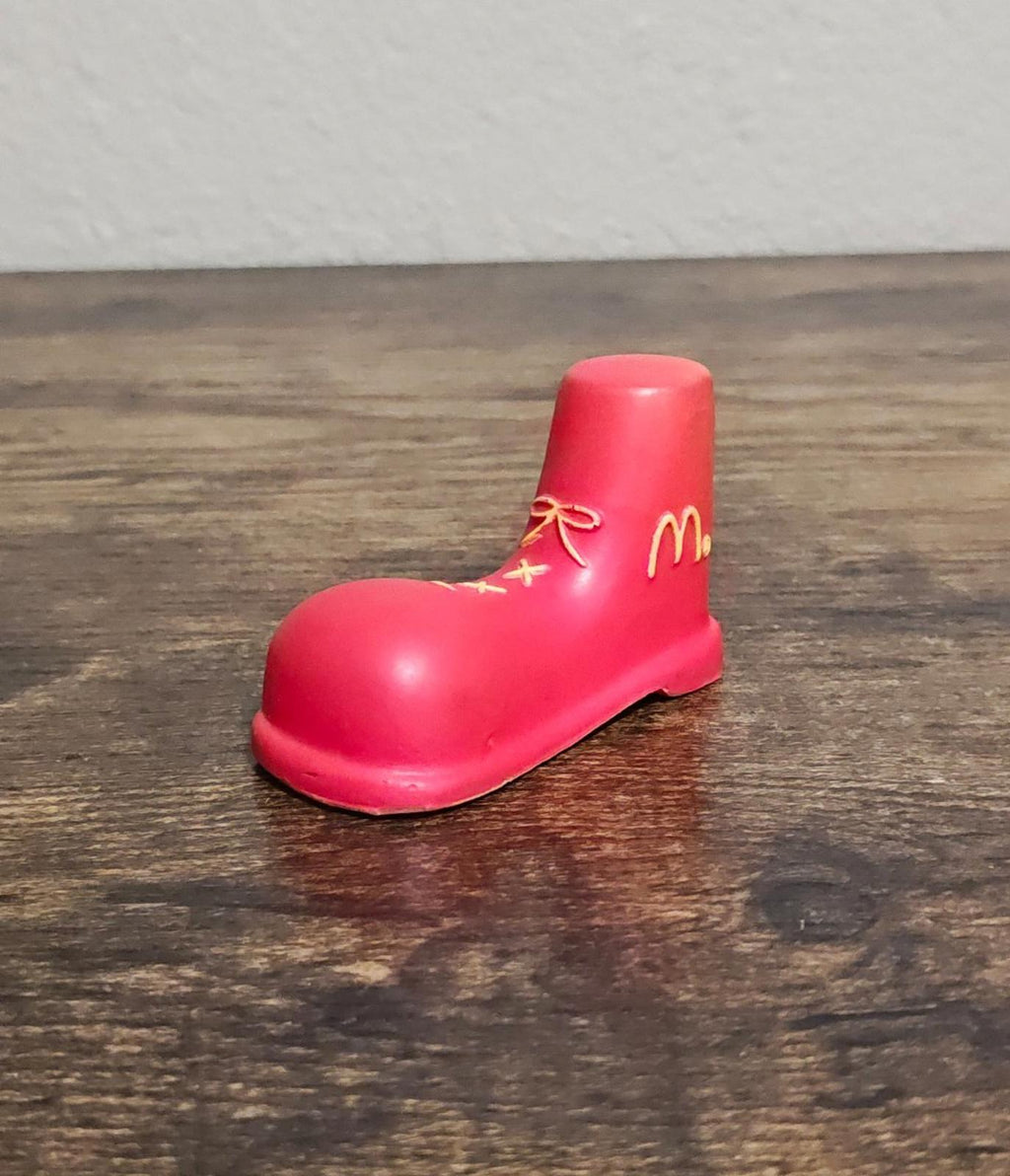 Red shoe antenna topper figurine side view with gold McDonald's logo and bow