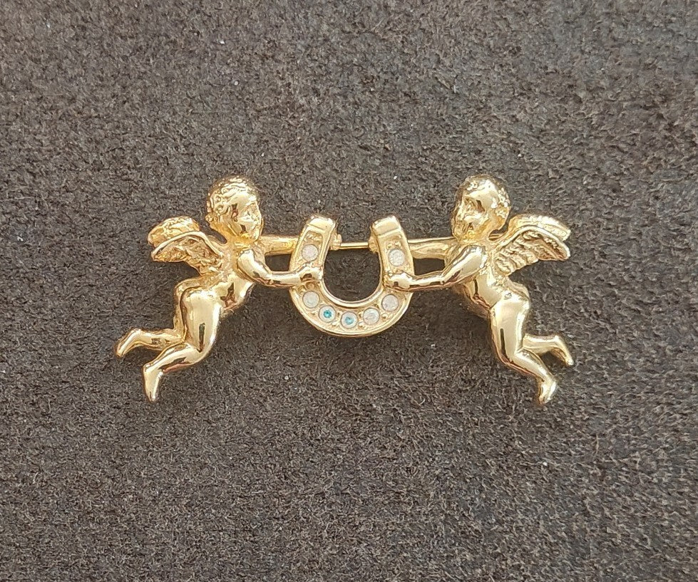 1980s Unsigned Kirks Folly Gold Tone Cherub & Lucky Horseshoe Brooch Pin