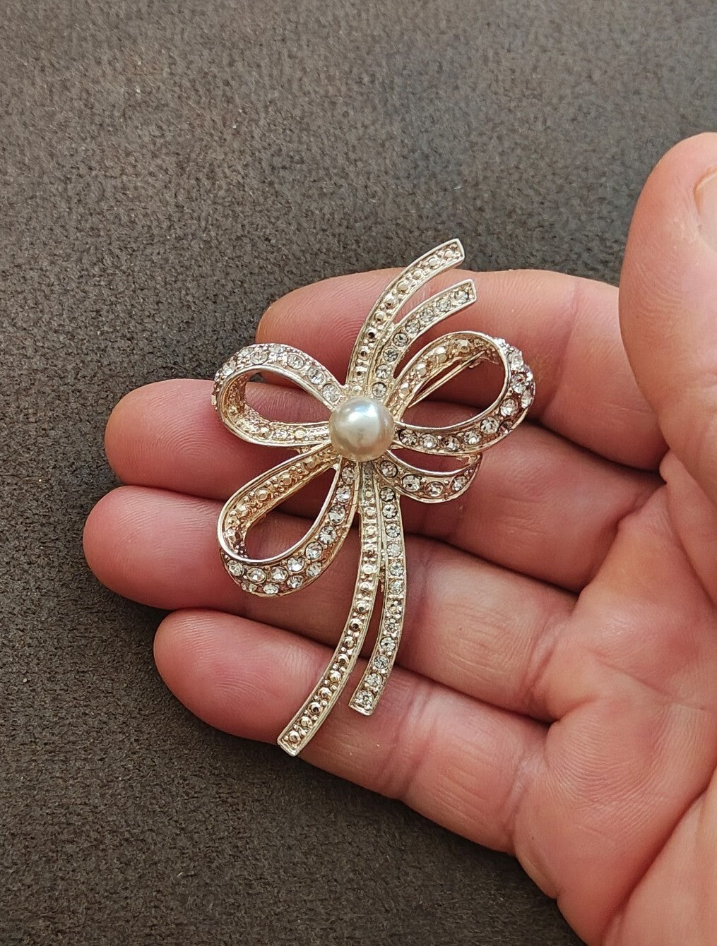 1980s Silver Tone Ribbon Bow With Clear Rhinestones & Large Faux Pearl Brooch