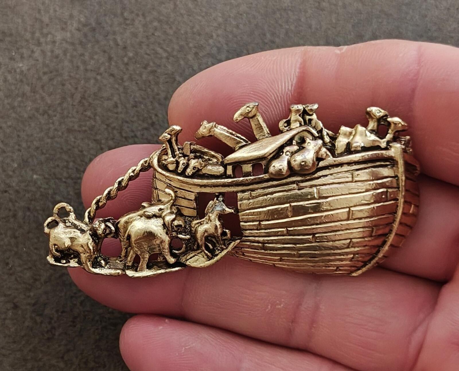 Gold tone Noah’s Ark brooch with miniature animal figures and detailed boat scene