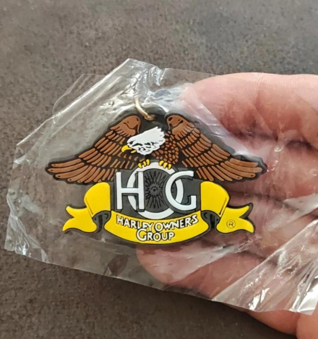 Harley-Davidson Owners Group rubber keychain fob with eagle wings and H.O.G. emblem