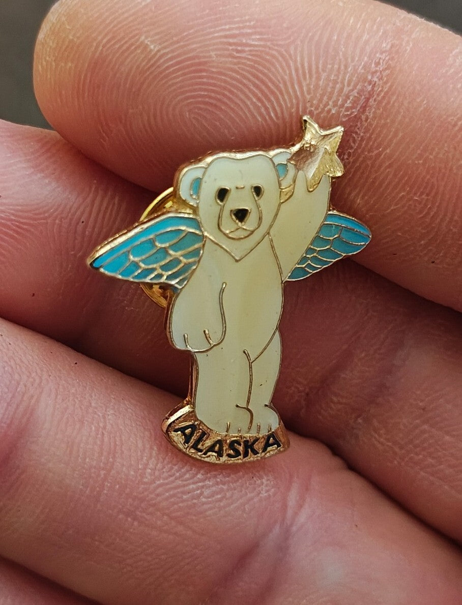 1980s Alaskan Polar Bear Guardian Angel Gold Tone Enamel Pin.