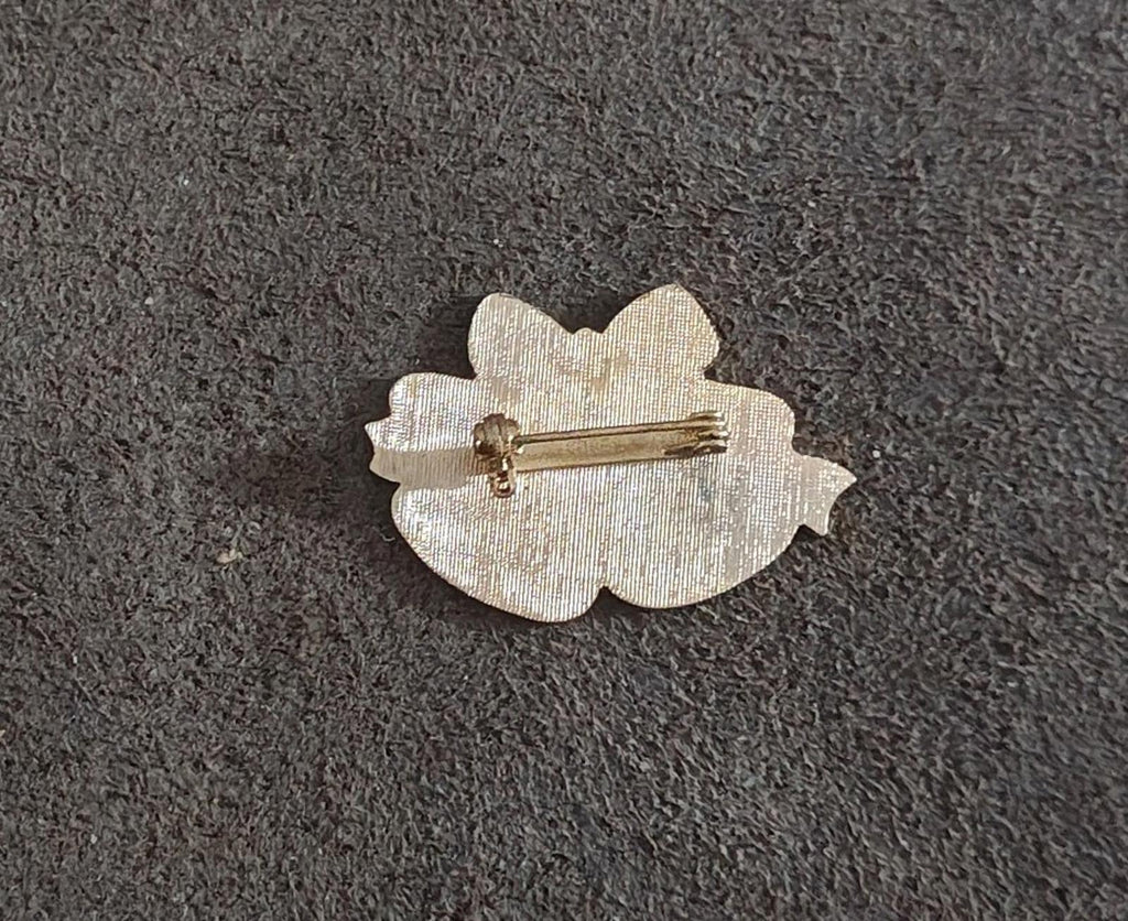 Gold tone enamel brooch back with pin and clasp, leaf-shaped backing