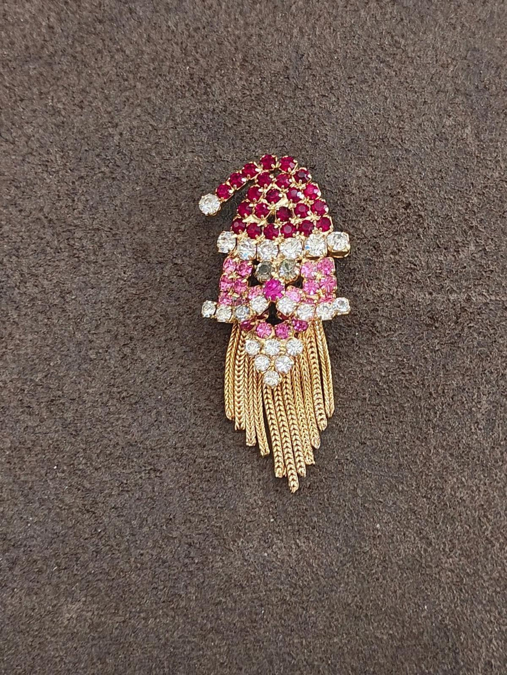 Red and pink rhinestone Santa brooch with gold-tone chain fringe, full view