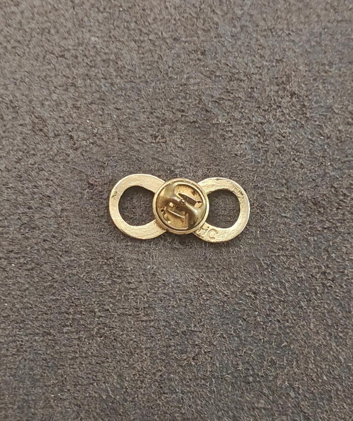 1950s/60s 24k Electroplated HC Infinity Brooch With Genuine Emerald Stone