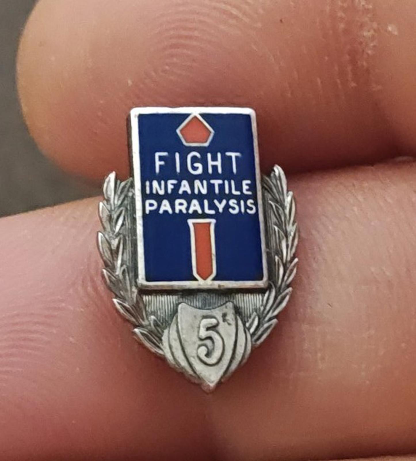 Silver lapel pin showing blue enamel square with “FIGHT INFANTILE PARALYSIS”