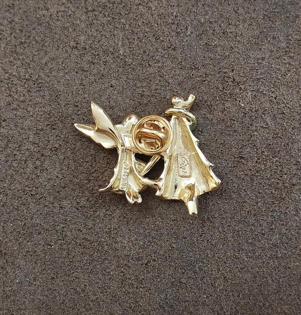 Gold-tone angel brooch pin back with safety clasp and circular maker mark