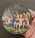 Trippie’s Inc 1995 Cherubs at Play Metal Coaster - Hans Zabateri Putti Angel Art