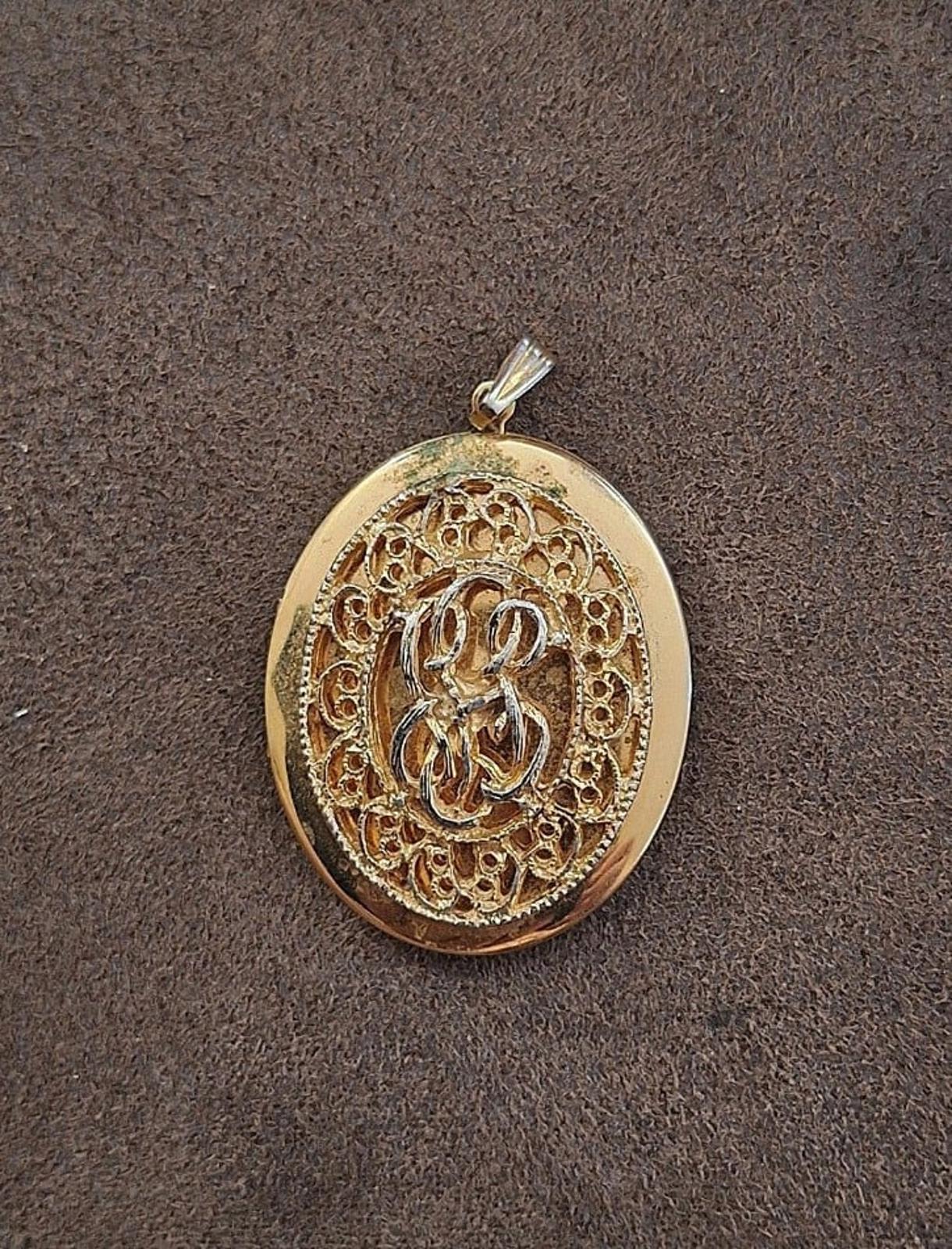 1980s Large Gold Tone Filigree Oval Locket Pendant