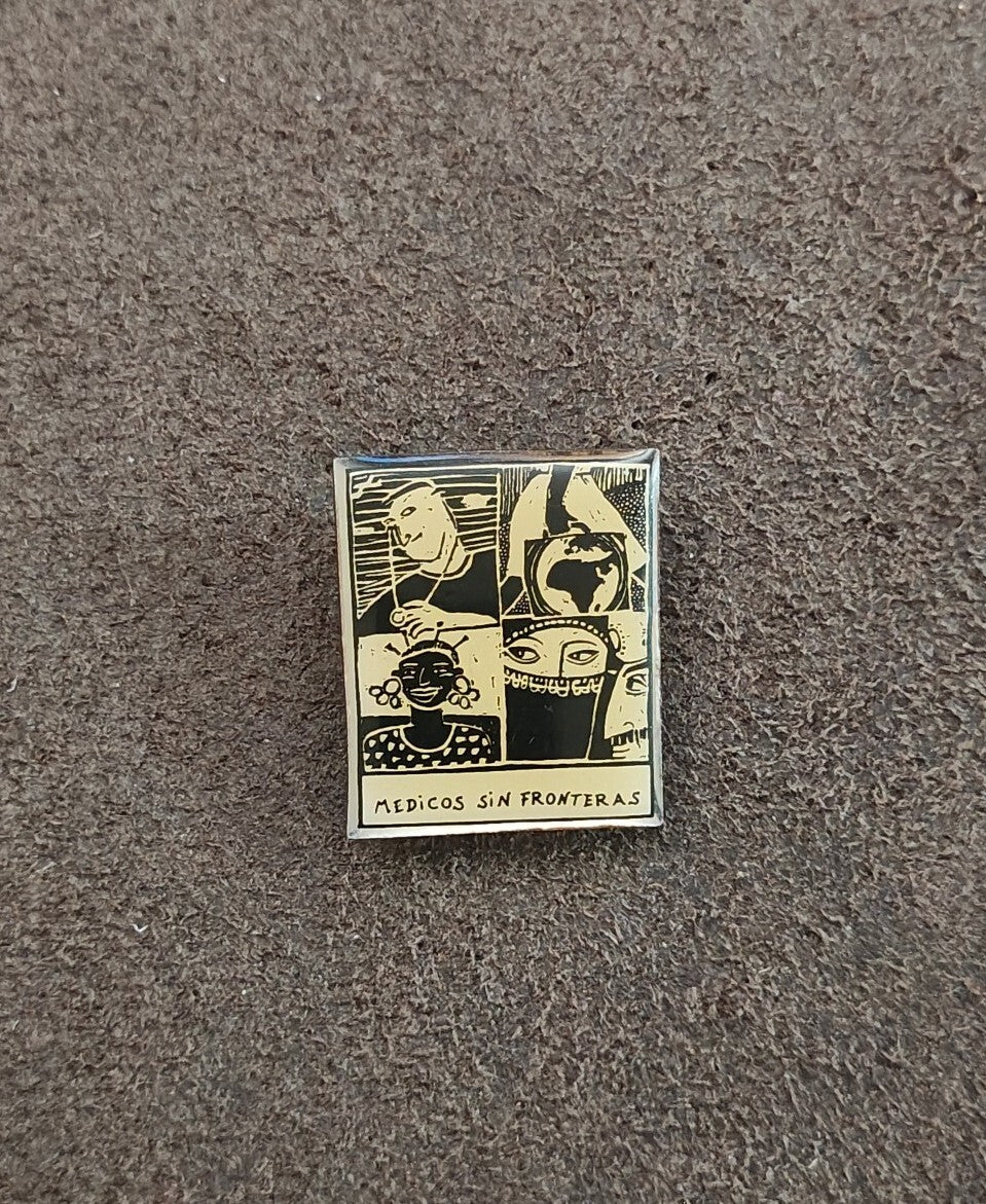 1990s Médicos Sin Fronteras (Doctors Without Borders) Silver Tone Enamel Pin