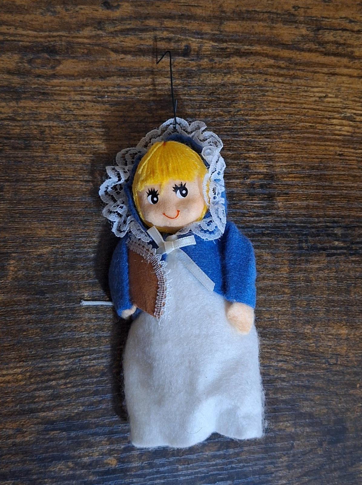 Handmade vintage pilgrim girl ornament figurine hanging, blue bonnet and white dress