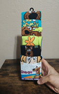 Men's crew socks 6-pack in colorful character prints, shown in retail box.