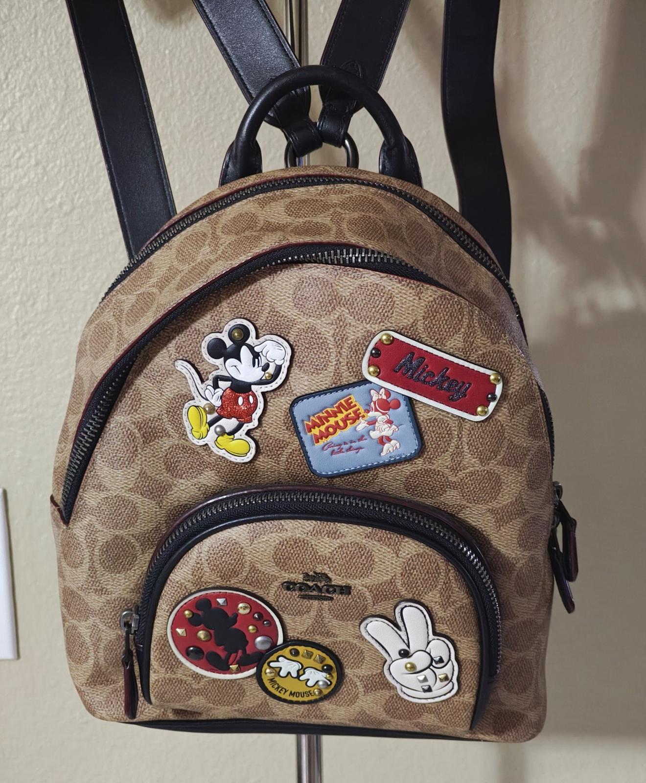 Disney X Coach Carrie Backpack 23 In Signature Canvas With Patches