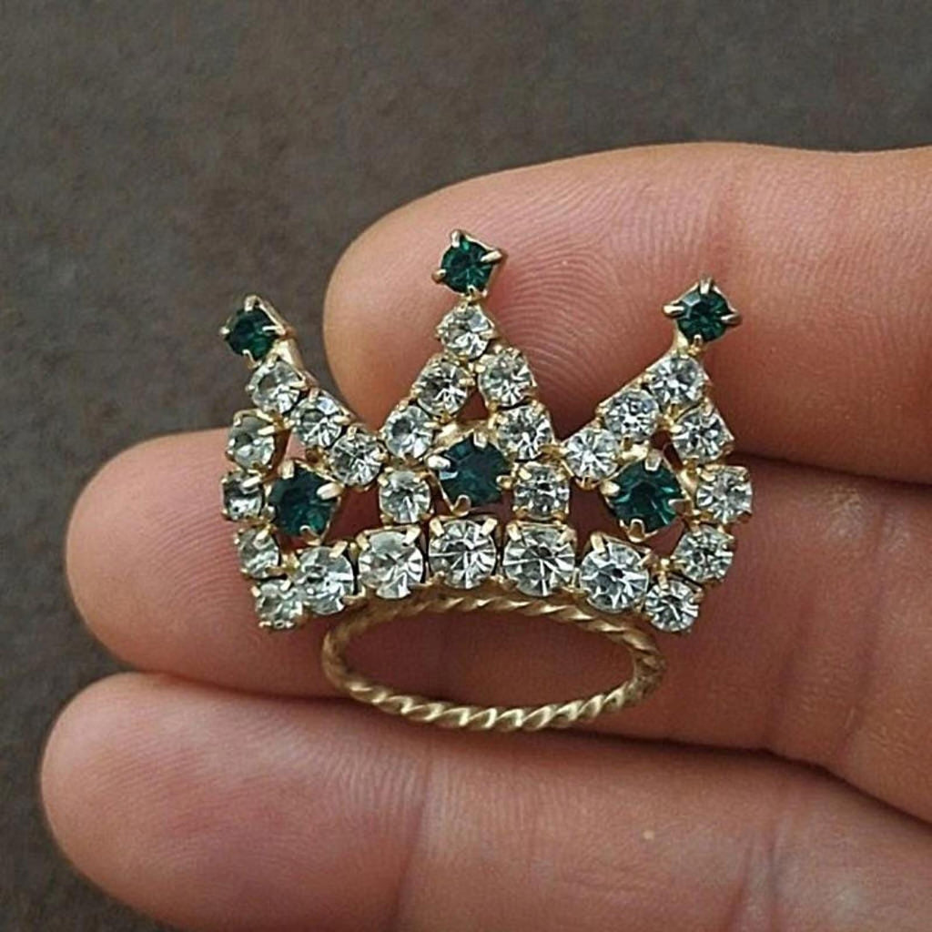 Crown tiara rhinestone brooch with green emerald-look stones and clear crystals, gold-tone