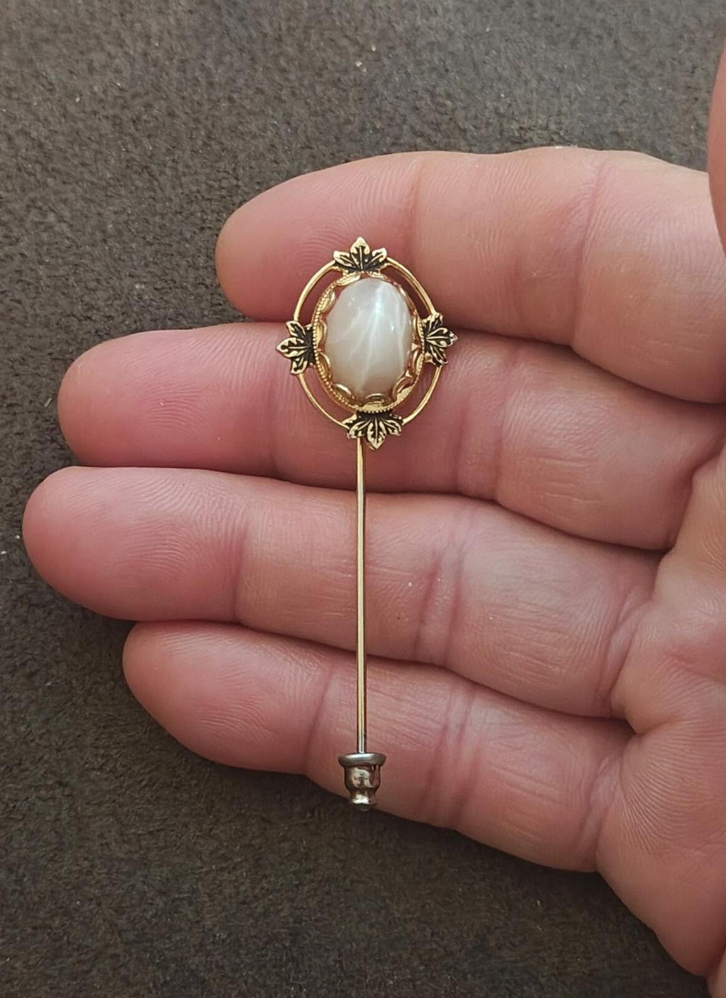 1980s Gold Tone Vintage Stick Pin Featuring a Central Cabochon Gemstone