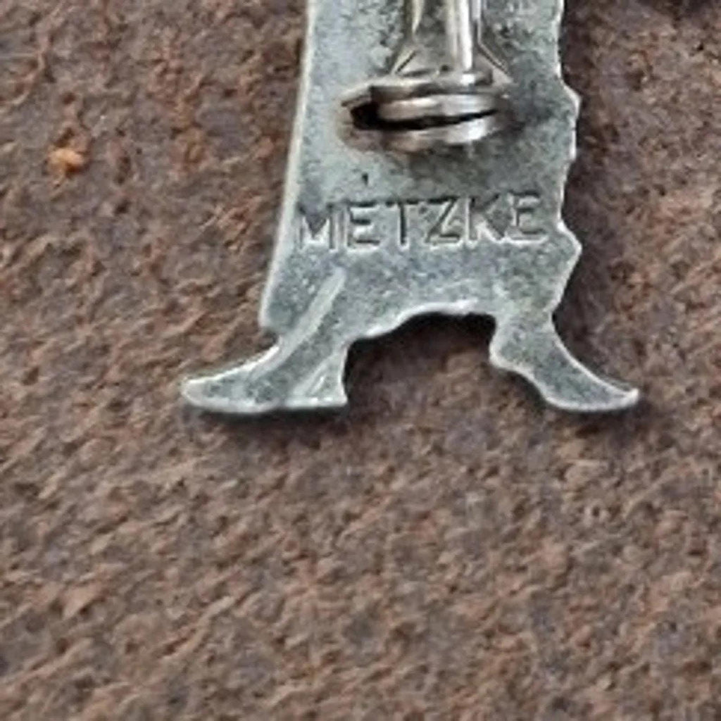 Metzke pewter brooch pin back, clasp area and METZKE stamping, silver-tone