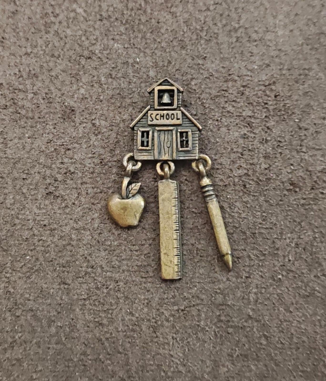 1980s JJ Jonette Teacher Theme Brass Dangle pin