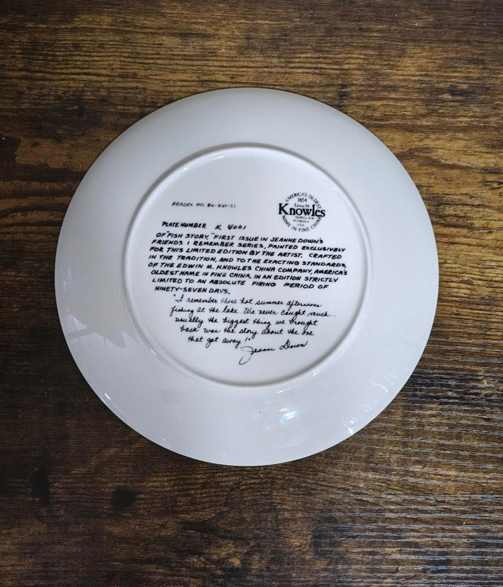 Blue ceramic plate back with Knowles mark and printed certificate text