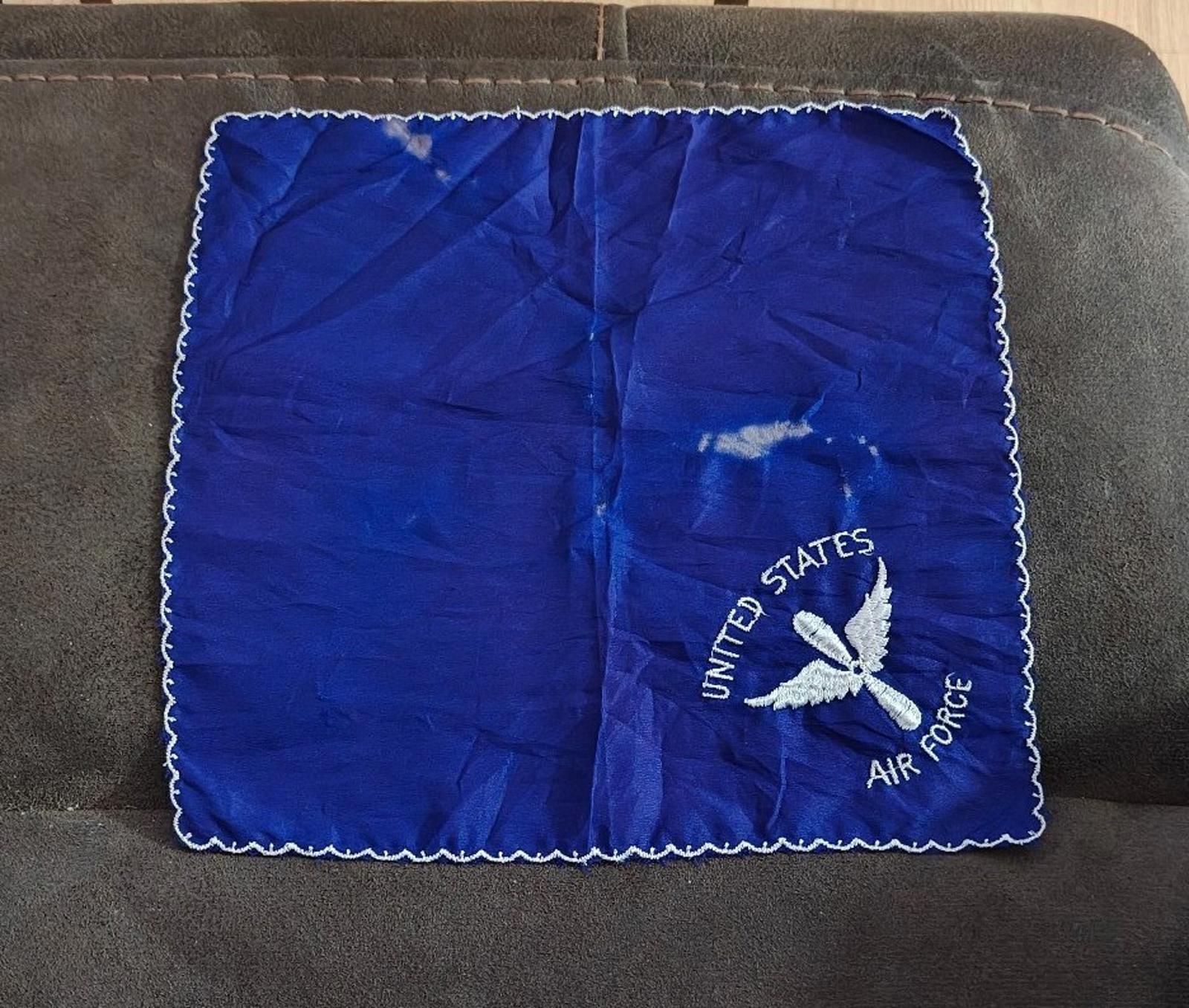 Blue embroidered handkerchief square with white scalloped trim and Air Force emblem