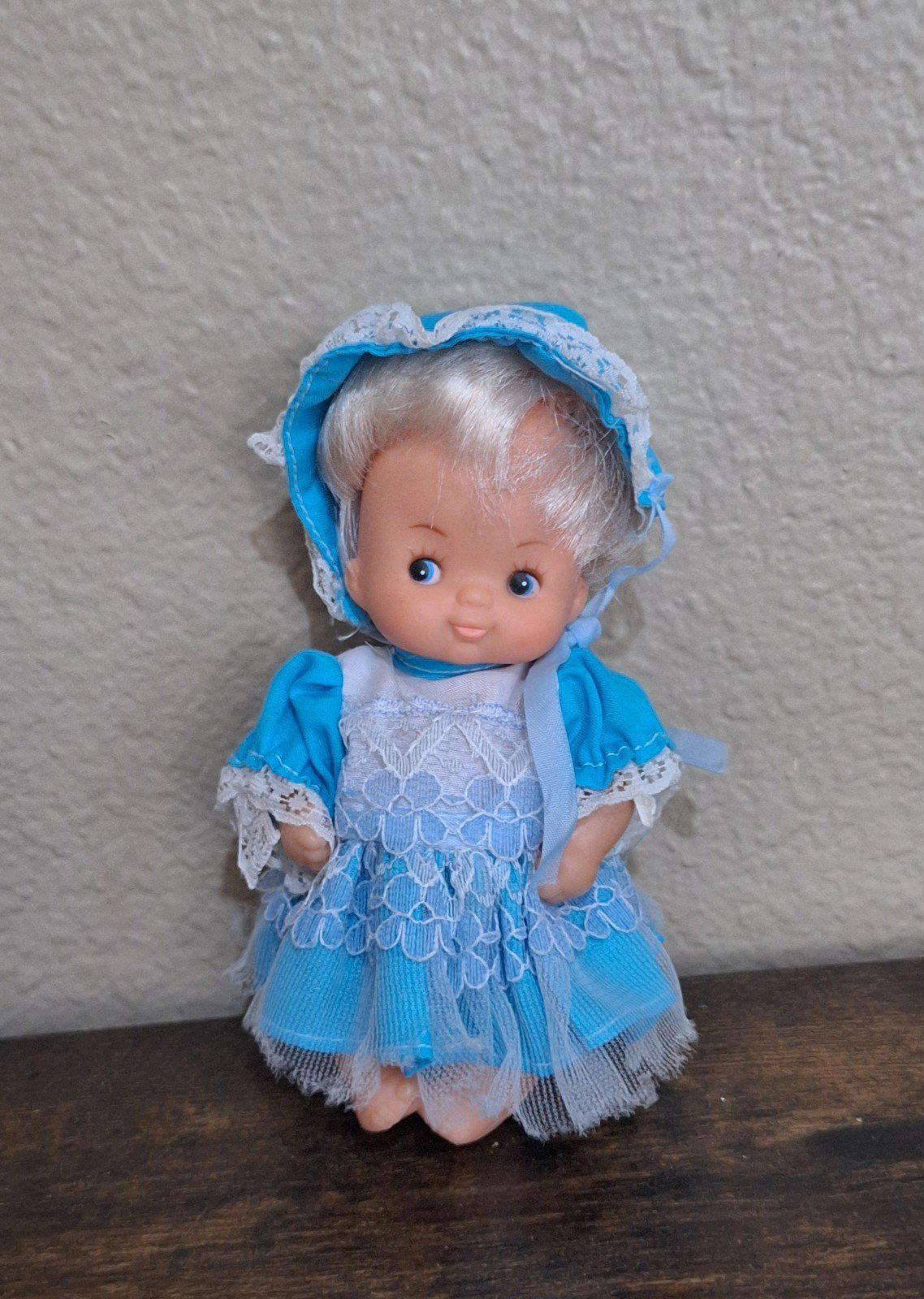 1970's Miniature Baby Doll With Blue Dress and Blue Eyes