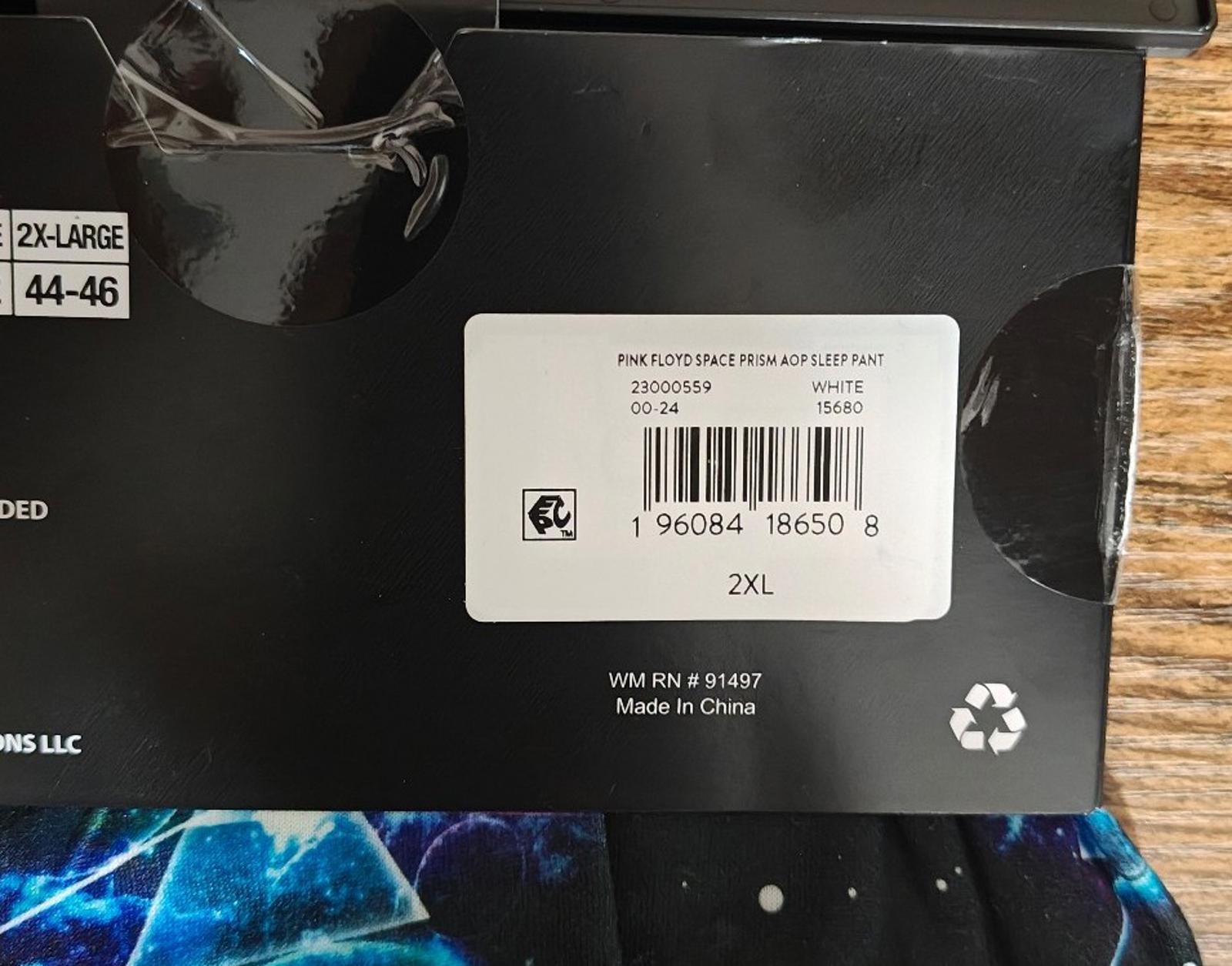 Black sleep pants packaging label with barcode and 2XL size marking