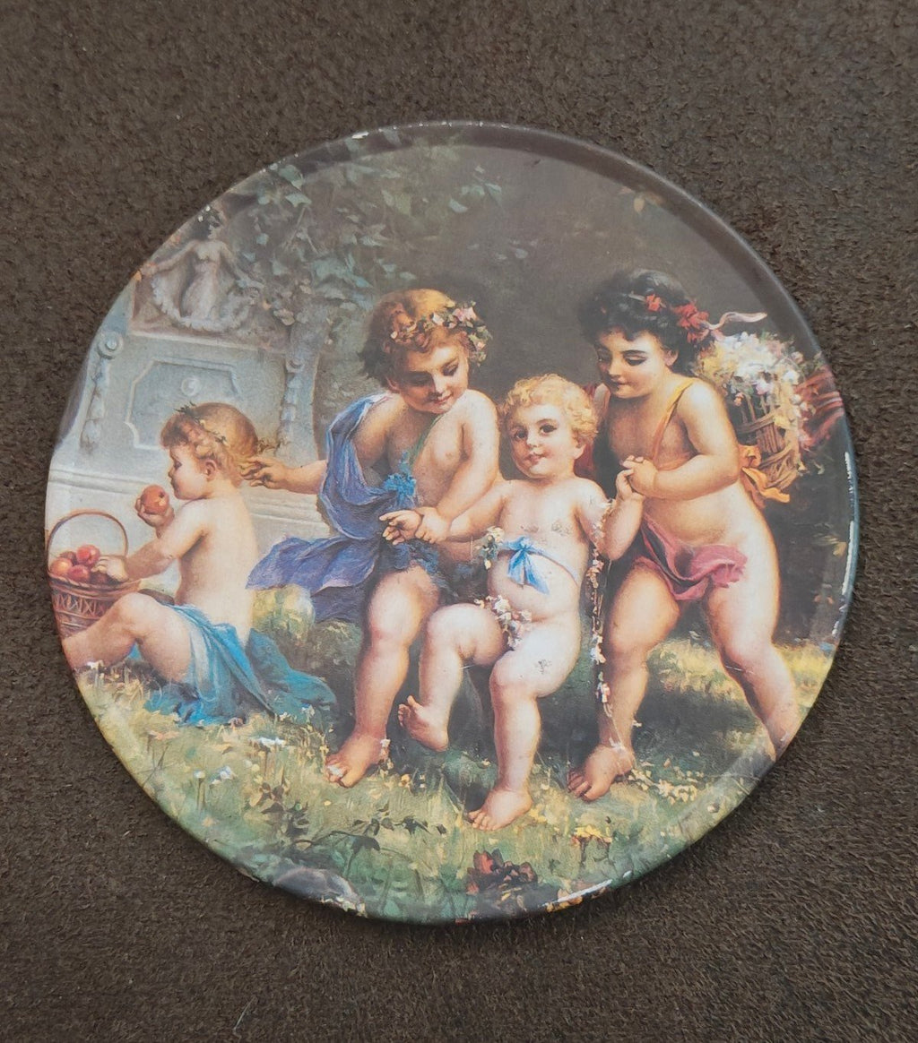 Trippie’s Inc 1995 Cherubs at Play Metal Coaster - Hans Zabateri Putti Angel Art
