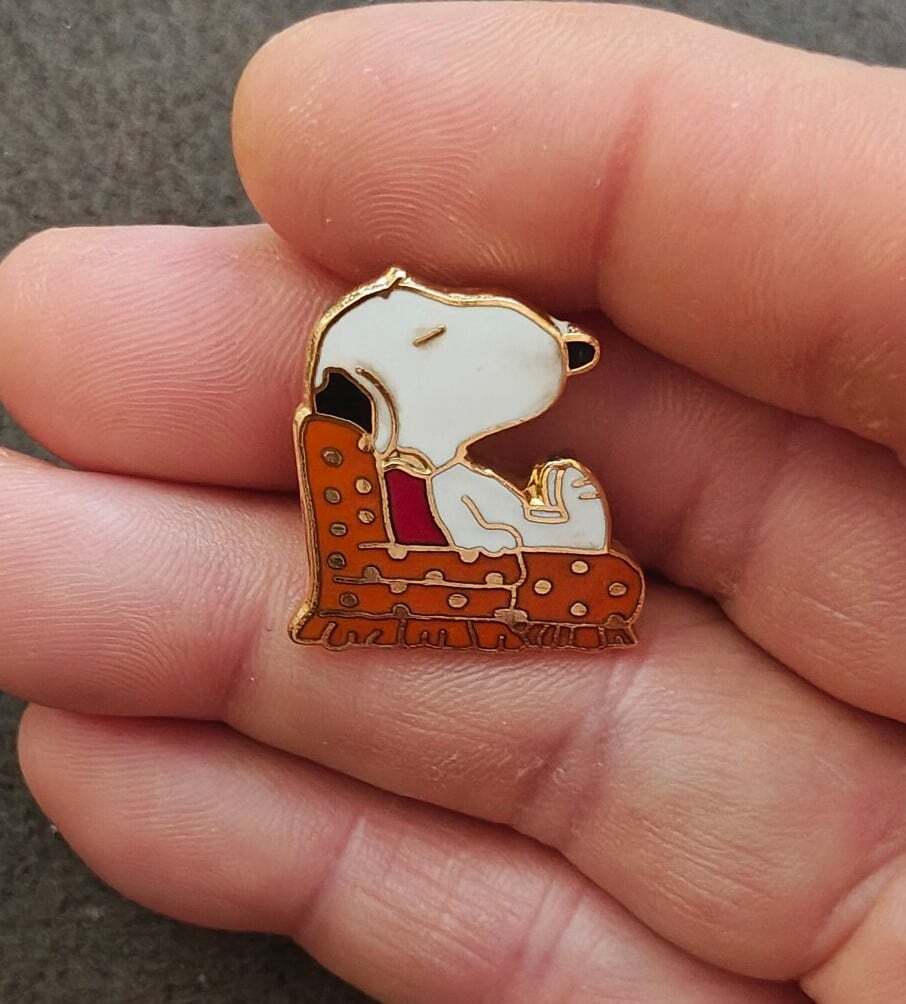 1970s Aviva Peanuts Snoopy in Orange Armchair Cloisonne Gold Tone Enamel Pin