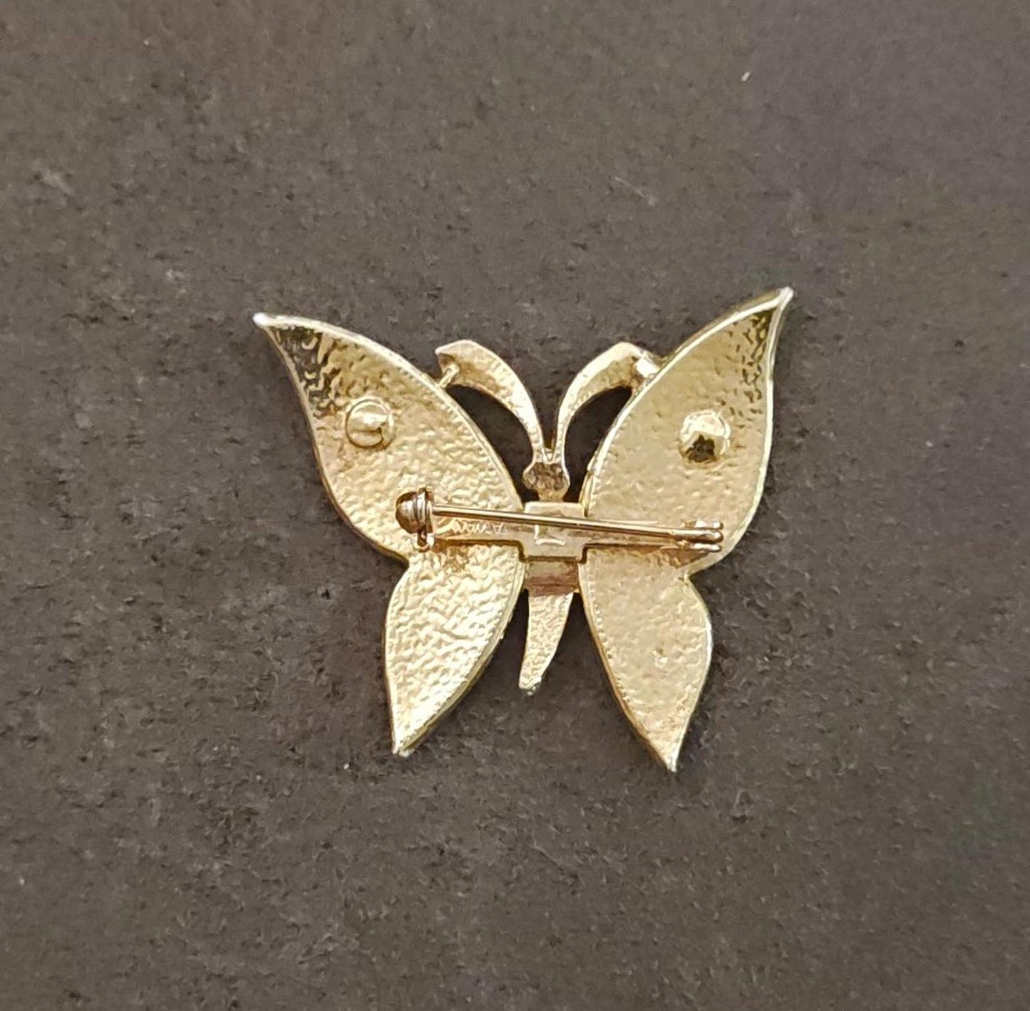 1980s Gold Tone With Green Enamel Textured Butterfly Brooch