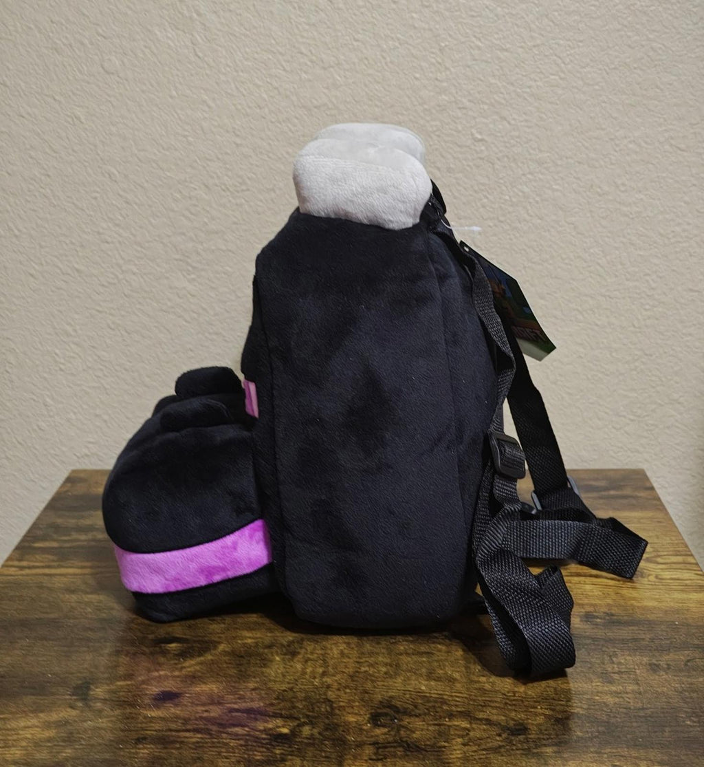 Plush Minecraft Ender backpack side view, black plush with adjustable strap and purple base trim