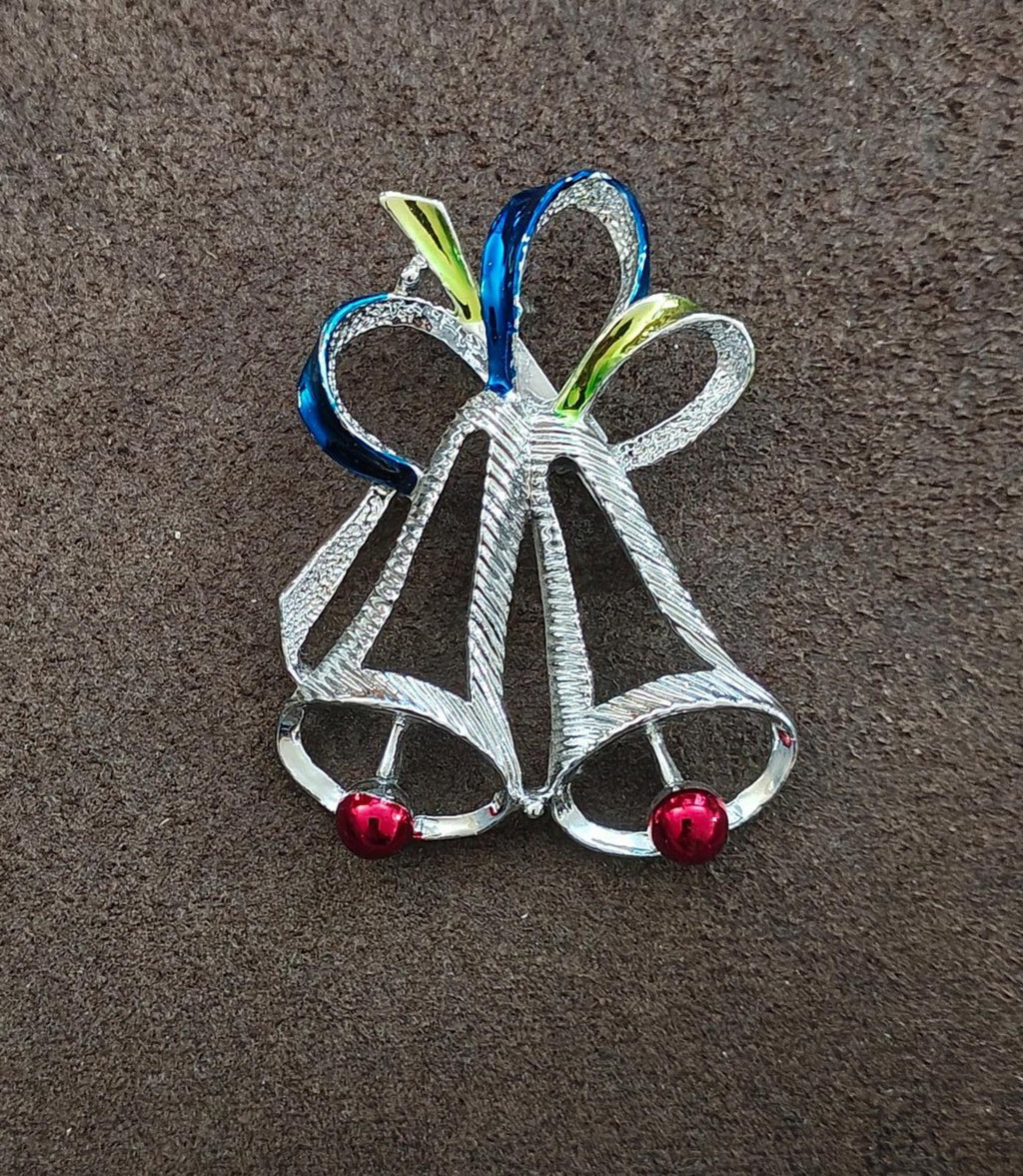 Bell-shaped Christmas brooch pin with blue and green enamel highlights and red bead feet